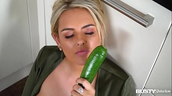 Busty seduction and blonde stunner Katie T. fills shaved pink with veggies