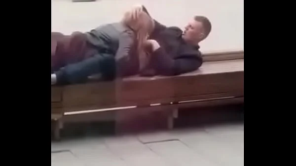 Stupid blonde gives blowjob in public