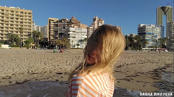 Wet shoot on a public beach with Crazy Model. Risky outdoor masturbation. Foot fetish. Pee in jeans.