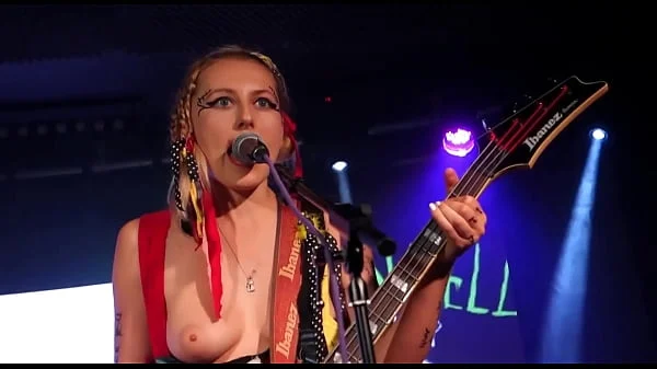 Here's A Random Female Rocker With One Of Her Titties Out