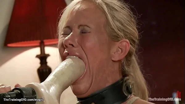 Busty MILF gets training on dildo