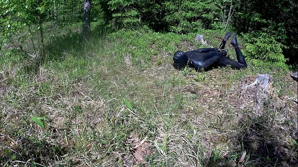 Outdoor hogtie in hot summer day.