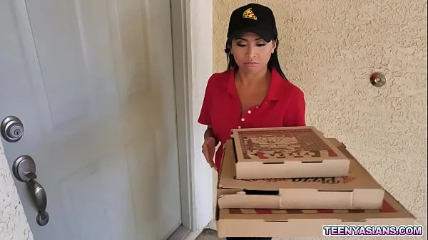 Two horny teens ordered some pizza and fucked this sexy asian delivery girl.