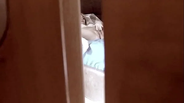 Spying behind a door a teen stepdaughter masturbating in bedroom and coming very intense